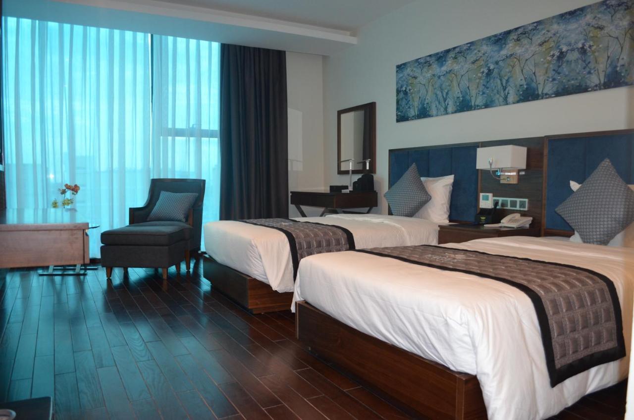 Eagle Hotel Dai Tiet Luaran gambar