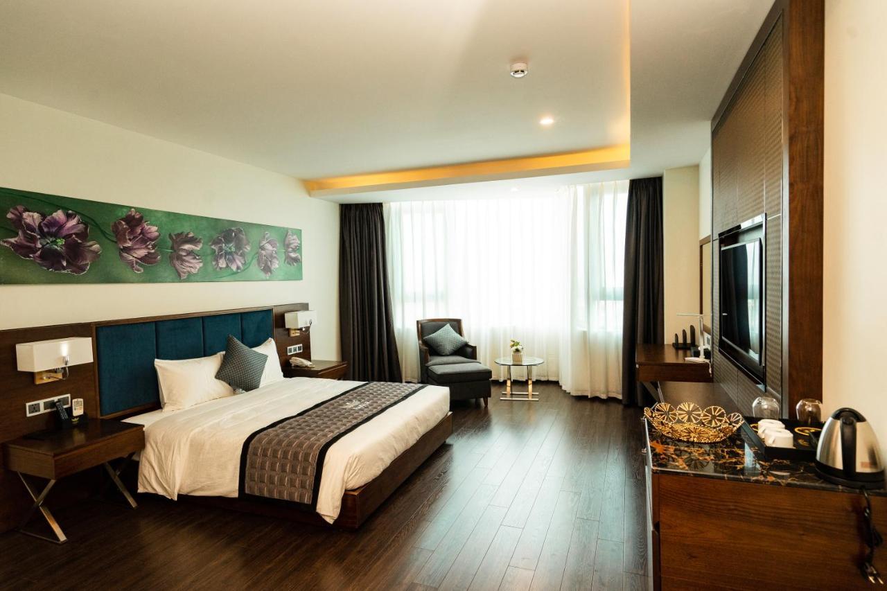 Eagle Hotel Dai Tiet Luaran gambar